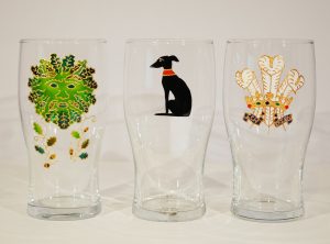 green man,the green man,green man art,celtic art,sitting hound,greyhound glassware,glass with greyhounds on,greyhound drinking glass,whippet drinking glass,3 feathers glass,three feathers glass,welsh glassware,welsh gifts,prince of wales feathers,